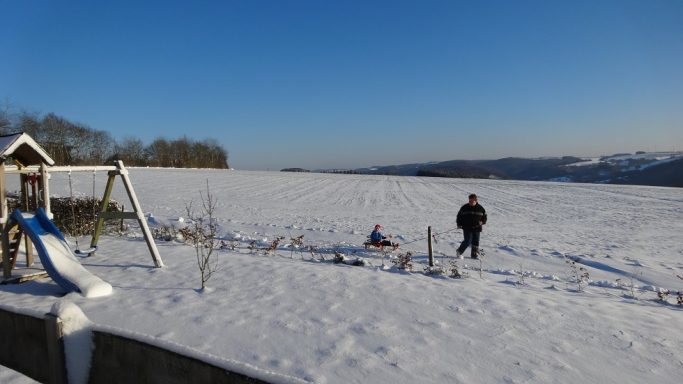 Winterblick- Schlittenfahren